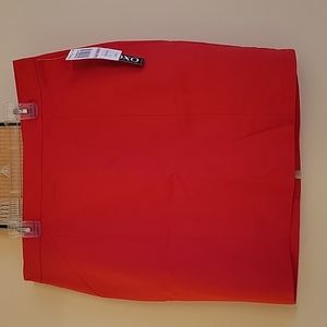 Red pencil skirt with slit in the back. 100% polyester. New with tags